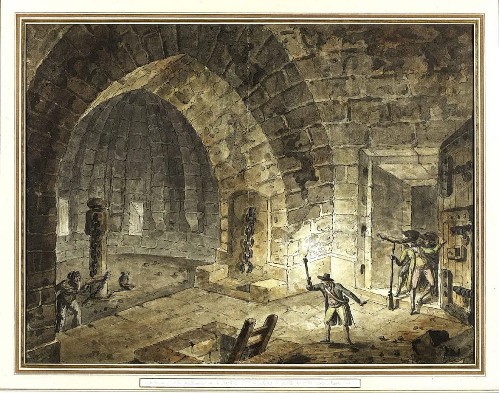 Intérieur d'un cachot — tyrannie de la Bastille, prisonnier enchaîné découvert. Source : Paris Musées